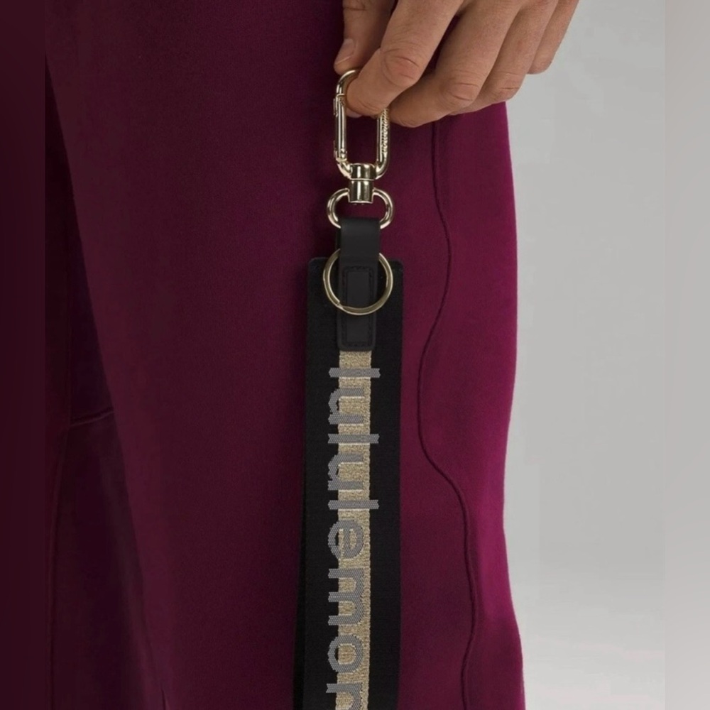 lululemon athletica Black Strap Keychain with Gold Hardware